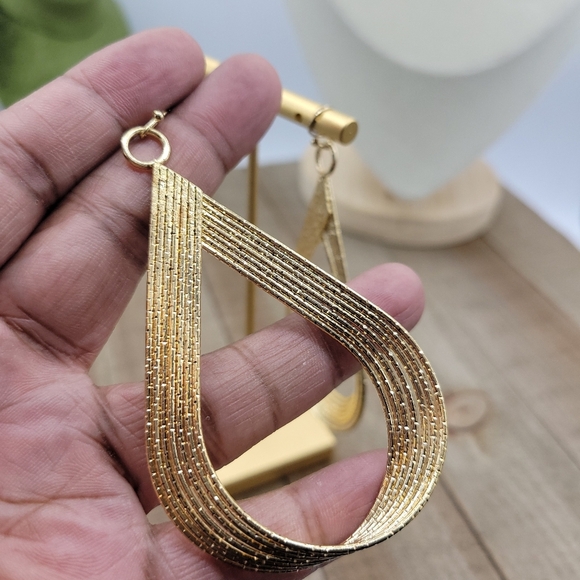 - Beautiful & Weighted Goldtone Hangar Earrings - Picture 4 of 4